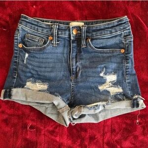 High-rise distressed denim shorts